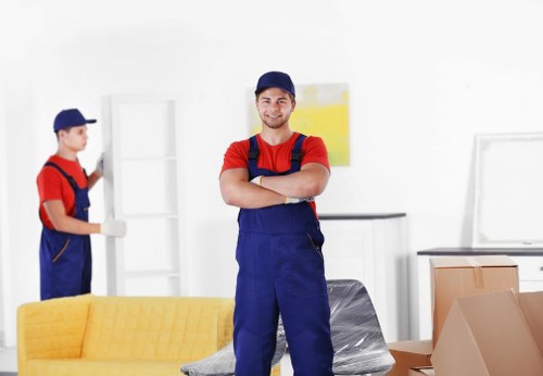 Professional movers handling furniture