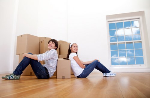 Happy family in their new home after using Finchley Storage removalists