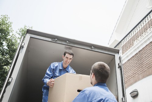 Experts unpacking and arranging household items