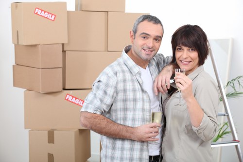 Removalists securely packing household items for transportation